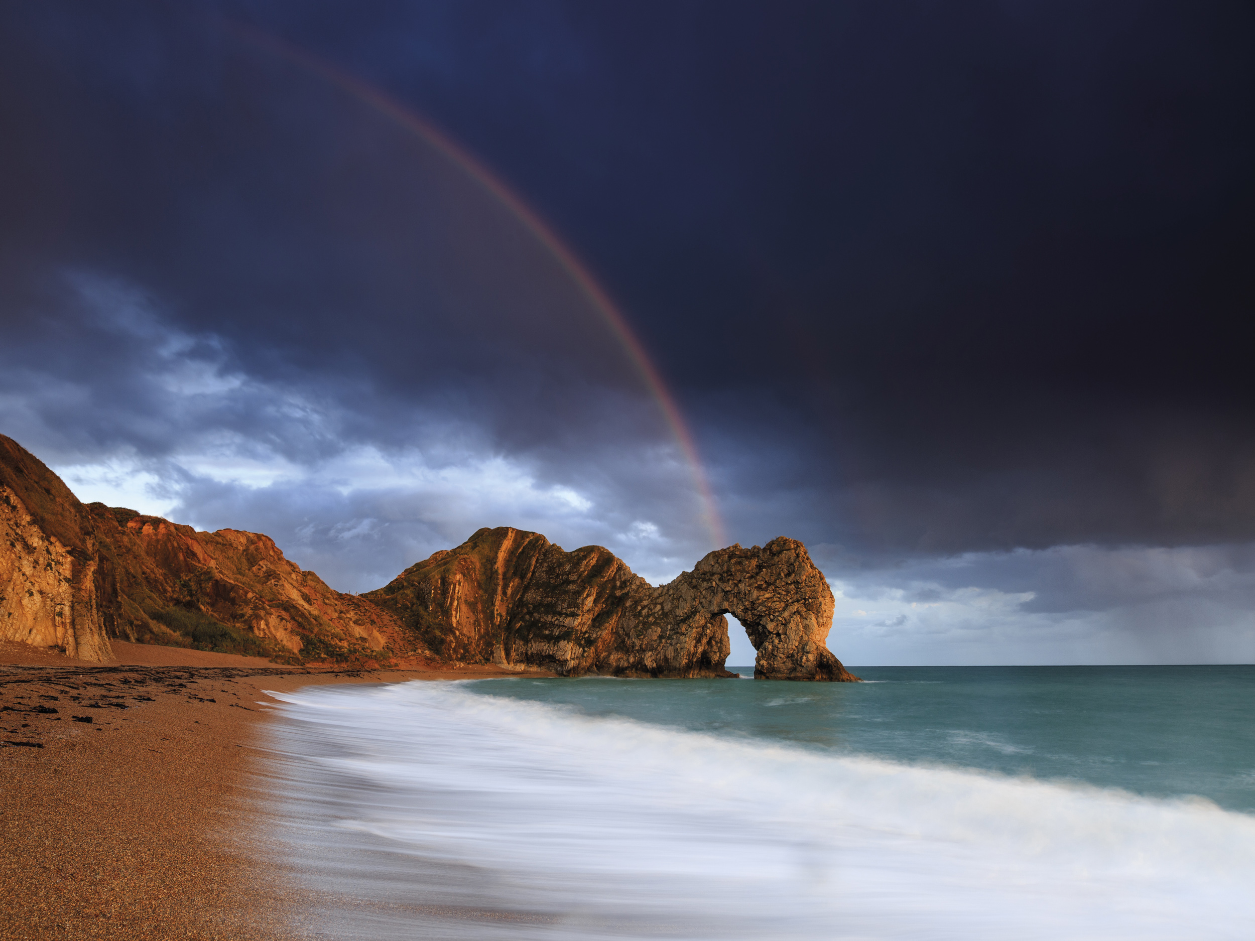 Rainbow over Durdle Door, Dorset.