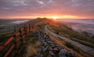 Sunrise and mist at Mam Tor in the Peak District.