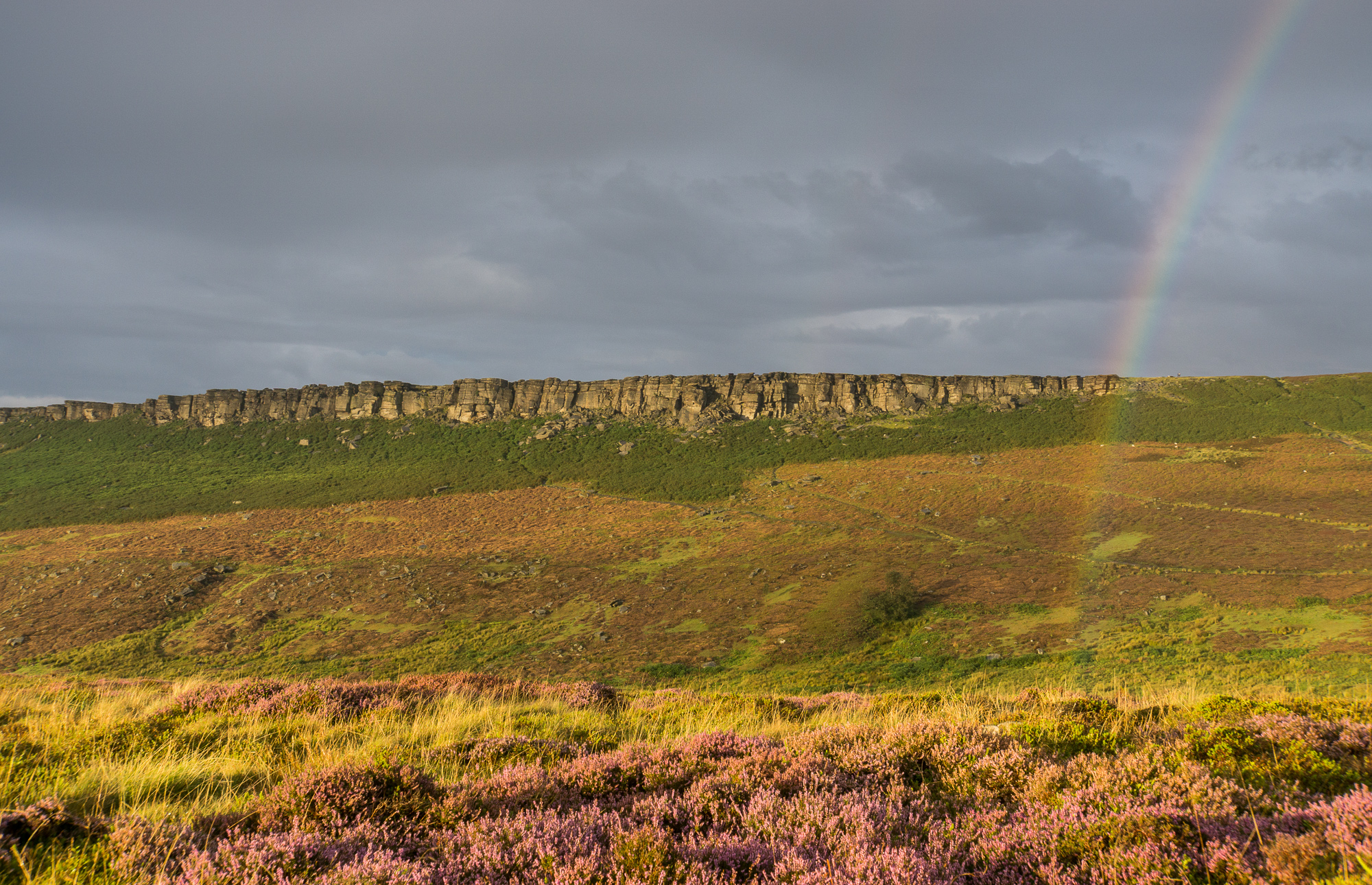 Rainbow in front of Stanage Edge in the Peak District.